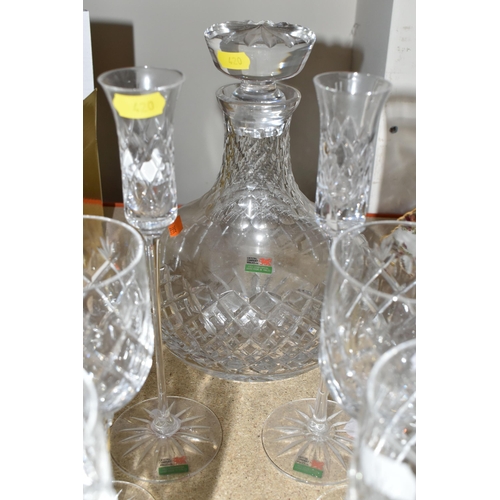 420 - A GROUP OF WELSH ROYAL CRYSTAL, comprising a large diamond cut lead crystal decanter, four air twist... 