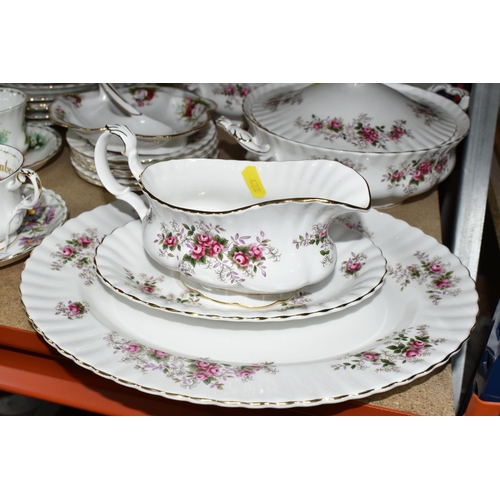 422 - A QUANTITY OF ROYAL ALBERT 'LAVENDER ROSE' PATTERN DINNERWARE, comprising a large oval meat plate (m... 