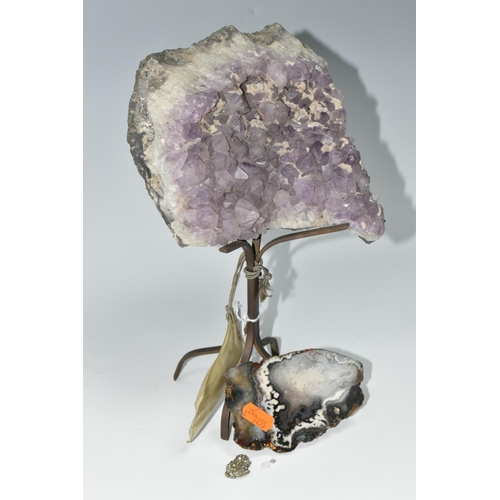 430 - AN AMETHYST CRYSTAL CLUSTER GEODE, supported by a metal display stand with original Harrod's store l... 