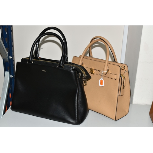 442 - TWO DESIGNER HANDBAGS, comprising a black DKNY handbag with detachable shoulder strap and DKNY bag c... 