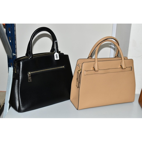 442 - TWO DESIGNER HANDBAGS, comprising a black DKNY handbag with detachable shoulder strap and DKNY bag c... 