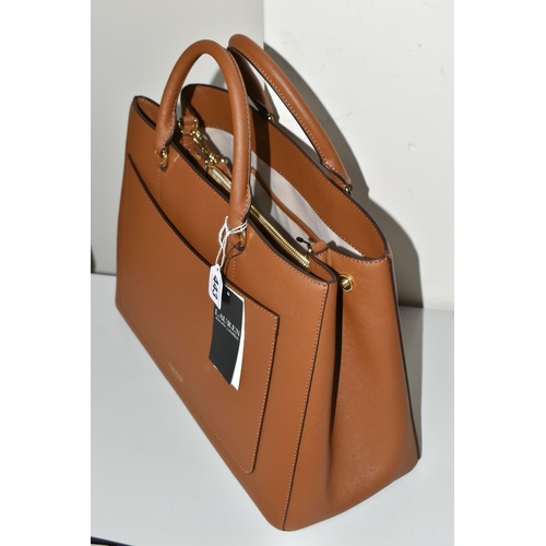 443 - A RALPH LAUREN LARGE TAN HANNA SATCHEL BAG, having removable shoulder strap, interior zipped and ope... 