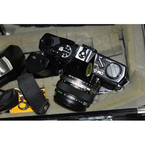 446 - A CASED OLYMPUS OM-2N 35MM CAMERA, LENS AND ACCESSORIES, camera fitted with an Olympus f1.8 50mm len... 