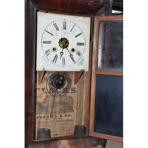 451 - AN AMERICAN JEROME & COMPANY SHELF CLOCK, a weight driven 30 hour clock, ogee moulded veneered case,... 