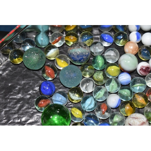 458 - A COLLECTION OF MARBLES, assorted sizes and designs, mixture of glass, agate and ceramic, all in pla... 