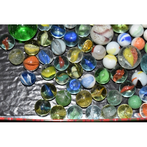 458 - A COLLECTION OF MARBLES, assorted sizes and designs, mixture of glass, agate and ceramic, all in pla... 