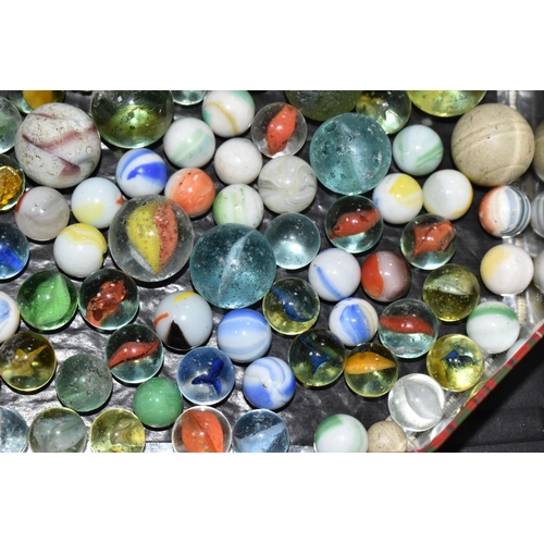 458 - A COLLECTION OF MARBLES, assorted sizes and designs, mixture of glass, agate and ceramic, all in pla... 