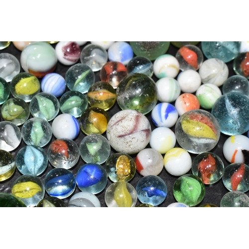 458 - A COLLECTION OF MARBLES, assorted sizes and designs, mixture of glass, agate and ceramic, all in pla... 