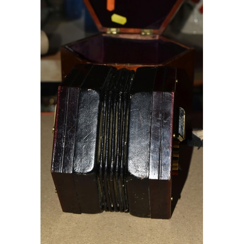 459 - A CASED LACHENAL AND CO OF LONDON CONCERTINA, fret cut ends, 48 buttons, label on the canvas lining ... 