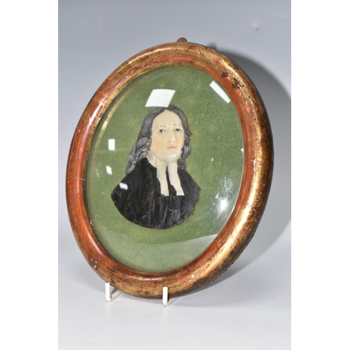 472 - A MOULDED WAX PORTRAIT BUST OF REV. JOHN WESLEY, mounted on green velvet and in an oval gilt frame, ... 