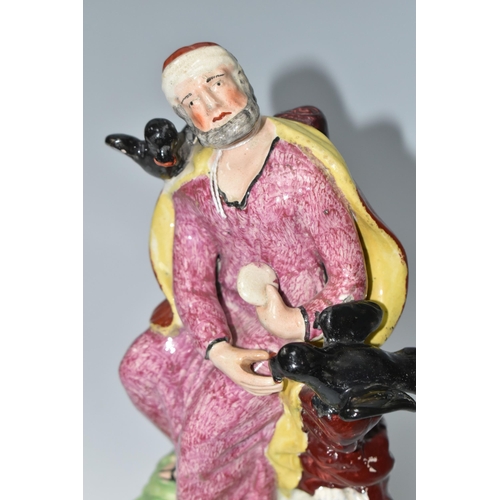 473 - AN EARLY 19TH CENTURY STAFFORDSHIRE EARTHENWARE FIGURE OF ELIJAH AND THE RAVENS, modelled on a squar... 