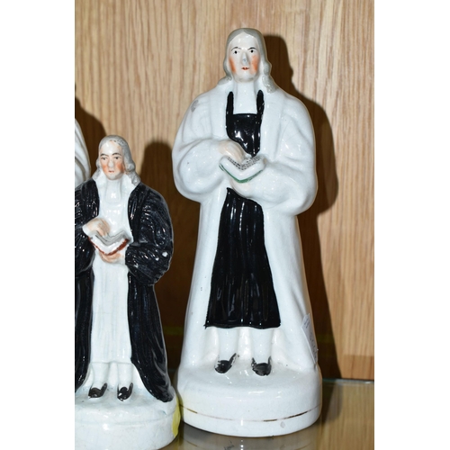 478 - FOUR 19TH CENTURY STAFFORDSHIRE POTTERY FIGURES OF REVEREND JOHN WESLEY, STANDING, all four modelled... 