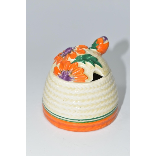 481 - A CLARICE CLIFF 'MARGUERITE' PATTERN PRESERVE POT AND COVER, the cover moulded and painted with oran... 