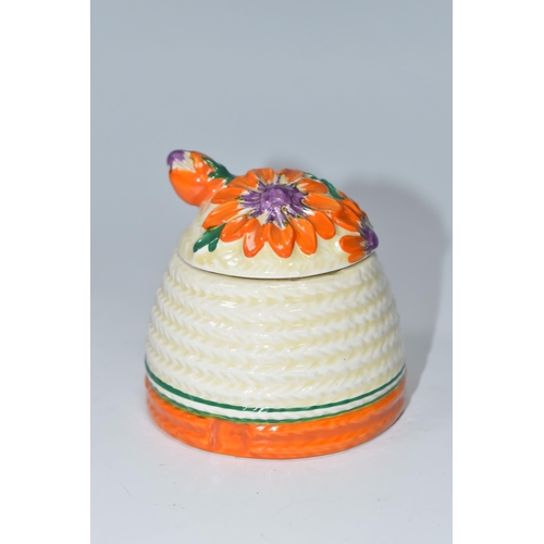 481 - A CLARICE CLIFF 'MARGUERITE' PATTERN PRESERVE POT AND COVER, the cover moulded and painted with oran... 