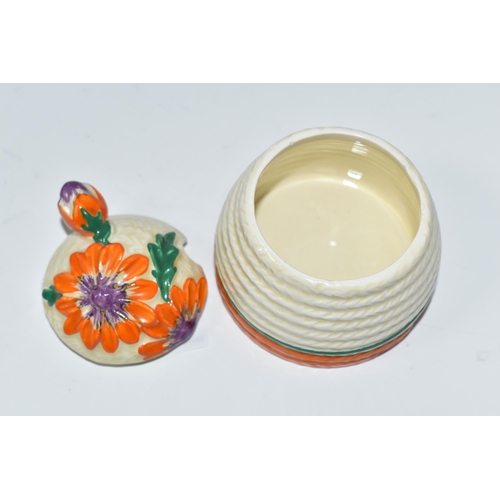 481 - A CLARICE CLIFF 'MARGUERITE' PATTERN PRESERVE POT AND COVER, the cover moulded and painted with oran... 