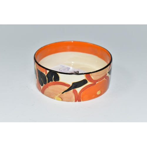 485 - A CLARICE CLIFF 'ORANGE CHINTZ' PATTERN POT, painted with stylised orange flowers with black foliage... 