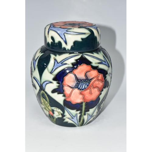 488 - A MOORCROFT POTTERY 'POPPY' PATTERN GINGER JAR AND COVER, tube lined with red poppies on a blue and ... 