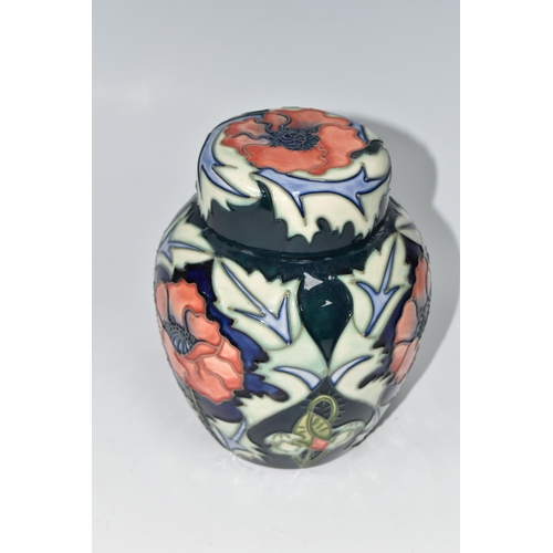 488 - A MOORCROFT POTTERY 'POPPY' PATTERN GINGER JAR AND COVER, tube lined with red poppies on a blue and ... 