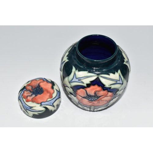 488 - A MOORCROFT POTTERY 'POPPY' PATTERN GINGER JAR AND COVER, tube lined with red poppies on a blue and ... 