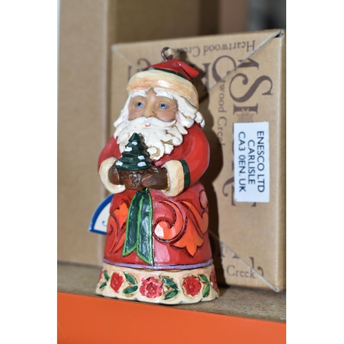 496 - EIGHT BOXED JIM SHORE RESIN CHRISTMAS FIGURES, comprising two 'Heaped with Holiday' sculptures of Sa... 