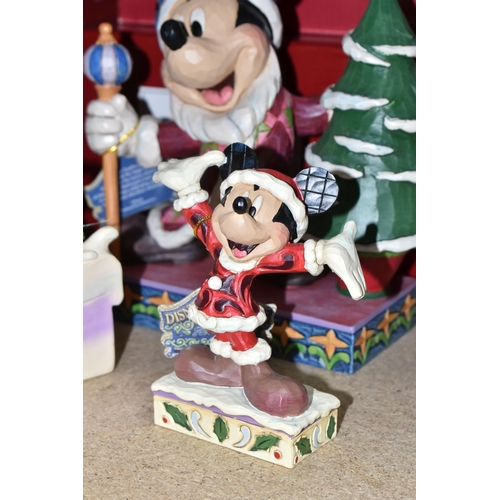 497 - SIX BOXED ENESCO 'DISNEY TRADITIONS' SCULPTURES, comprising 'Here comes Old St Mick', 'Merry tree tr... 