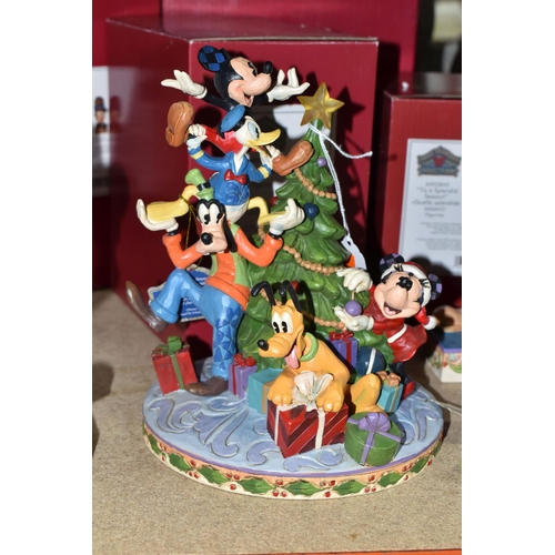 497 - SIX BOXED ENESCO 'DISNEY TRADITIONS' SCULPTURES, comprising 'Here comes Old St Mick', 'Merry tree tr... 