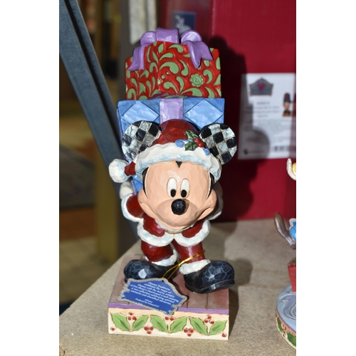 497 - SIX BOXED ENESCO 'DISNEY TRADITIONS' SCULPTURES, comprising 'Here comes Old St Mick', 'Merry tree tr... 