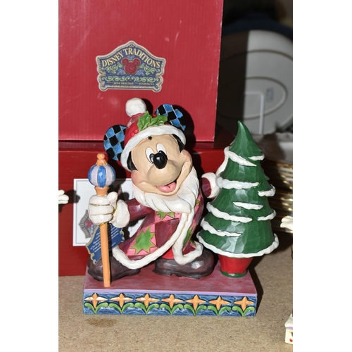 497 - SIX BOXED ENESCO 'DISNEY TRADITIONS' SCULPTURES, comprising 'Here comes Old St Mick', 'Merry tree tr... 