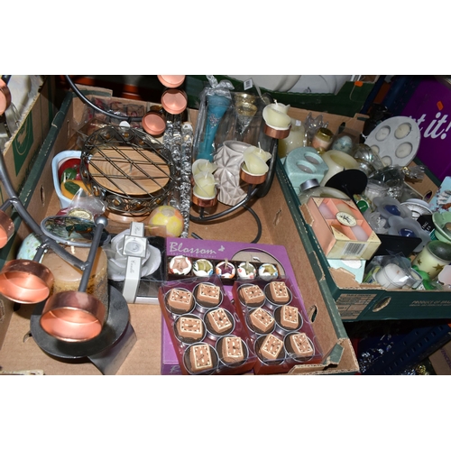 502 - THREE BOXES OF CANDLES AND CANDLE HOLDERS ETC, to include tealights in the form of chocolates and fl... 