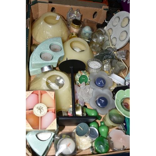 502 - THREE BOXES OF CANDLES AND CANDLE HOLDERS ETC, to include tealights in the form of chocolates and fl... 