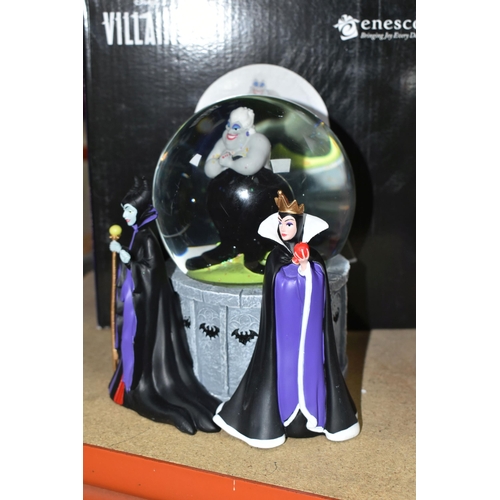 505 - THREE BOXED DISNEY SNOW GLOBES, comprising two illuminated Disney Villain examples with Ursula insid... 