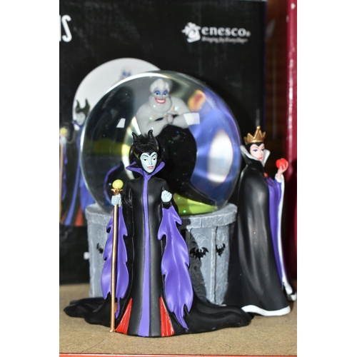 505 - THREE BOXED DISNEY SNOW GLOBES, comprising two illuminated Disney Villain examples with Ursula insid... 