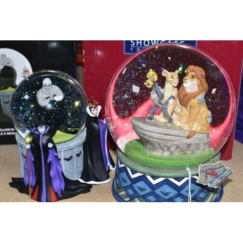 505 - THREE BOXED DISNEY SNOW GLOBES, comprising two illuminated Disney Villain examples with Ursula insid... 