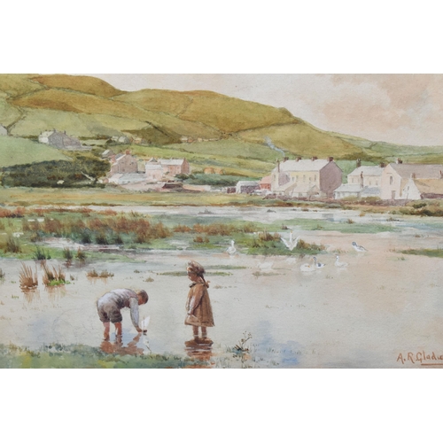 513 - ALLEN R GLADWELL (MID 20TH CENTURY) RIVER LANDSCAPE WITH CHILDREN, depicting a young girl and boy pl... 