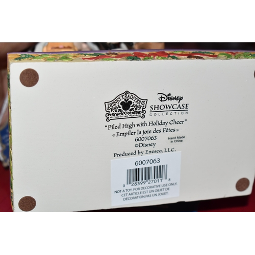 516 - SIX BOXED ENESCO DISNEY SHOWCASE COLLECTION CHRISTMAS FIGURES, from the Disney Traditions collection... 