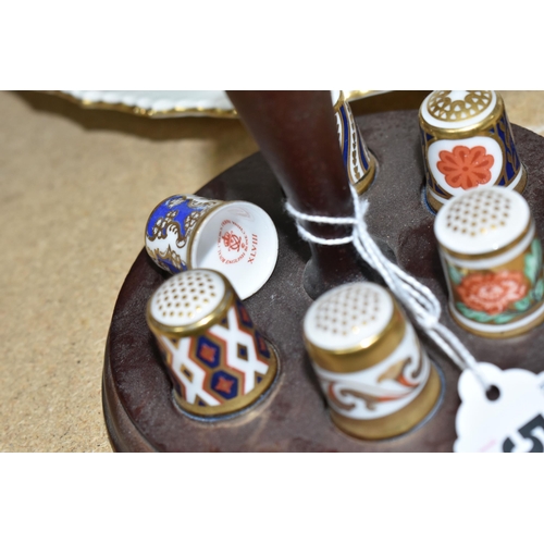 518 - A GROUP OF ROYAL CROWN DERBY DINNER, TEA AND GIFT WARES, comprising a wooden stand holding six diffe... 