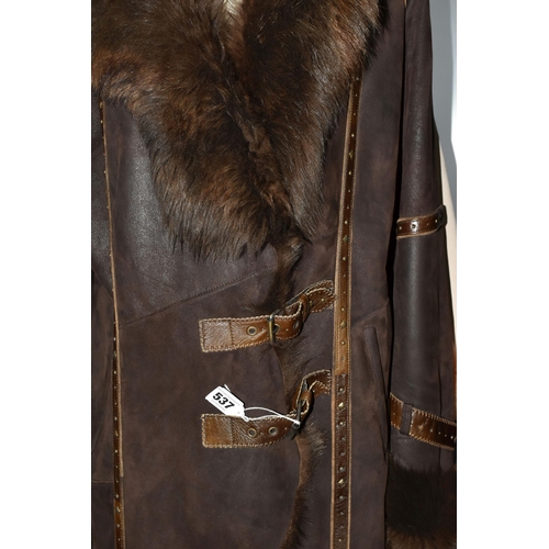 537 - A SUEDE CAPE WITH FUR COLLAR AND BROWN LEATHER LADIES SHEEPSKIN, comprising an apricot coloured sued... 