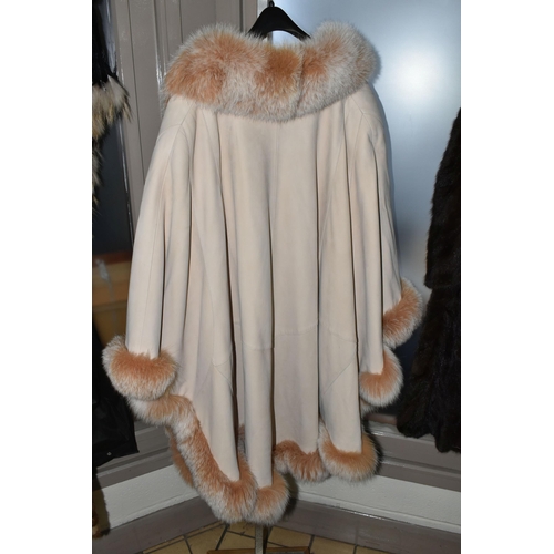 537 - A SUEDE CAPE WITH FUR COLLAR AND BROWN LEATHER LADIES SHEEPSKIN, comprising an apricot coloured sued... 