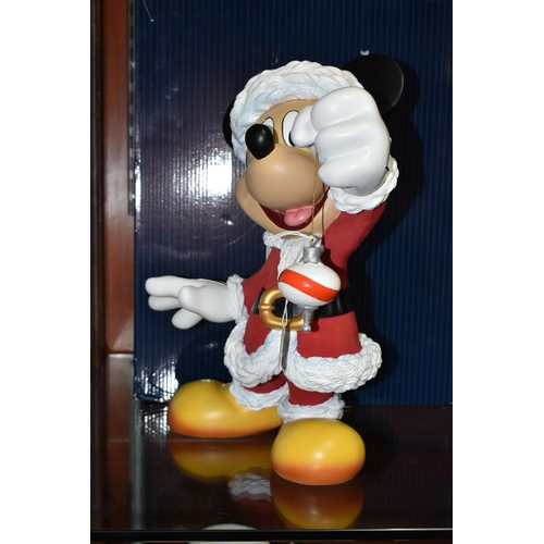 541 - A BOXED ENESCO DISNEY SHOWCASE COLLECTION 'SANTA MICKEY' FIGURE, model no 6009029, depicting Mickey ... 