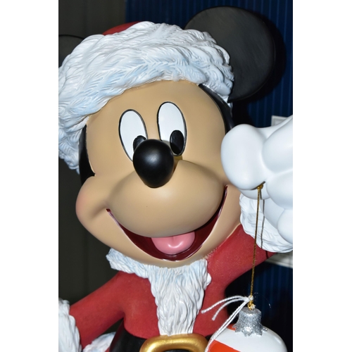 541 - A BOXED ENESCO DISNEY SHOWCASE COLLECTION 'SANTA MICKEY' FIGURE, model no 6009029, depicting Mickey ... 