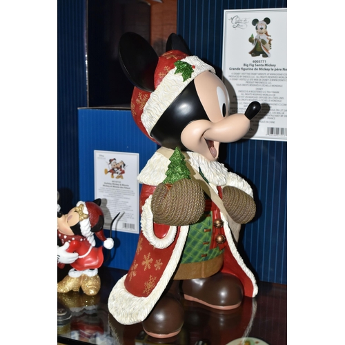 542 - TWO BOXED ENESCO DISNEY SHOWCASE COLLECTION MICKEY MOUSE FIGURES, comprising 'Big Fig Santa Mickey' ... 