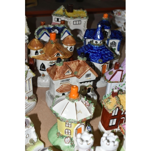 577 - A GROUP OF PASTILLE BURNERS AND COTTAGE ORNAMENTS, comprising 19th and 20th century Coalport and Sta... 