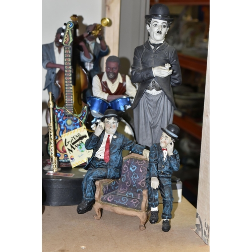 588 - FOURTEEN ASSORTED CERAMIC AND RESIN FIGURES, to include black jazz musicians, 'Sweet Lorraine' nurse... 