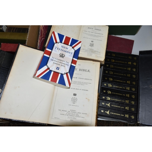 603 - A BOX OF BIBLES AND CHRISTIAN THEMED BOOKS ETC, to include a leather bound Bible with metal mounts, ... 