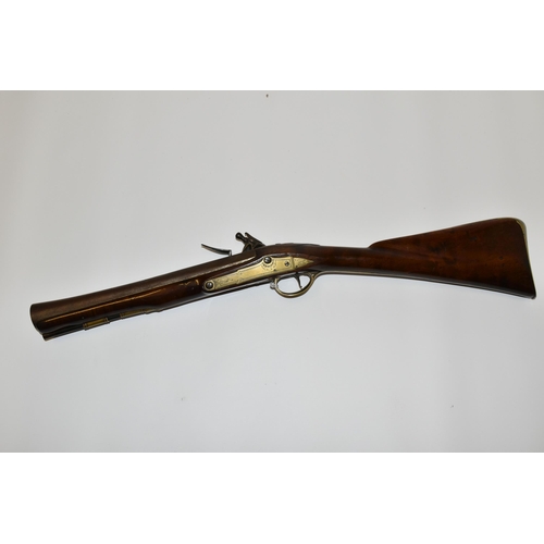 281 - AN ANTIQUE FLINTLOCK BLUNDERBUSS, fitted with a 30'' steel flared muzzle barrel, the lock bears the ... 