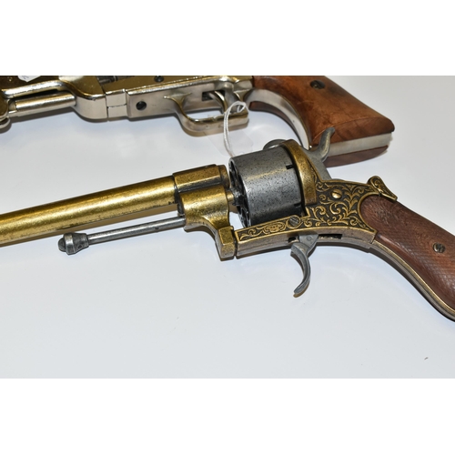 285 - THREE WHITE METAL REPLICA REVOLVERS, designed so they are incapable of conversion to fire live cartr... 