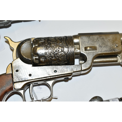 285 - THREE WHITE METAL REPLICA REVOLVERS, designed so they are incapable of conversion to fire live cartr... 