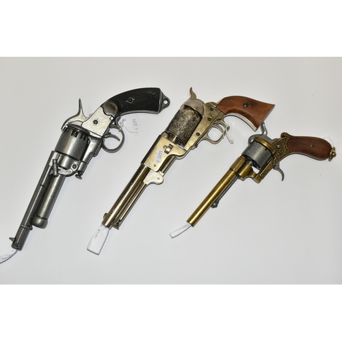 285 - THREE WHITE METAL REPLICA REVOLVERS, designed so they are incapable of conversion to fire live cartr... 