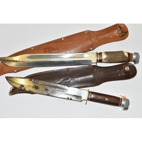 286 - TWO HIGH QUALITY GERMAN HUNTING SHEATH KNIVES IN FITTED LEATHER SHEATHS, each bearing the motif of a... 