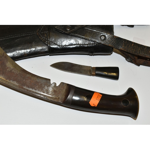 291 - A NEPALESE GURKHA KUKRI KNIFE, in its leather scabbard complete with its Kardar and Chakma knives